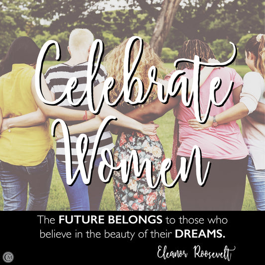 Women walking arm in arm together